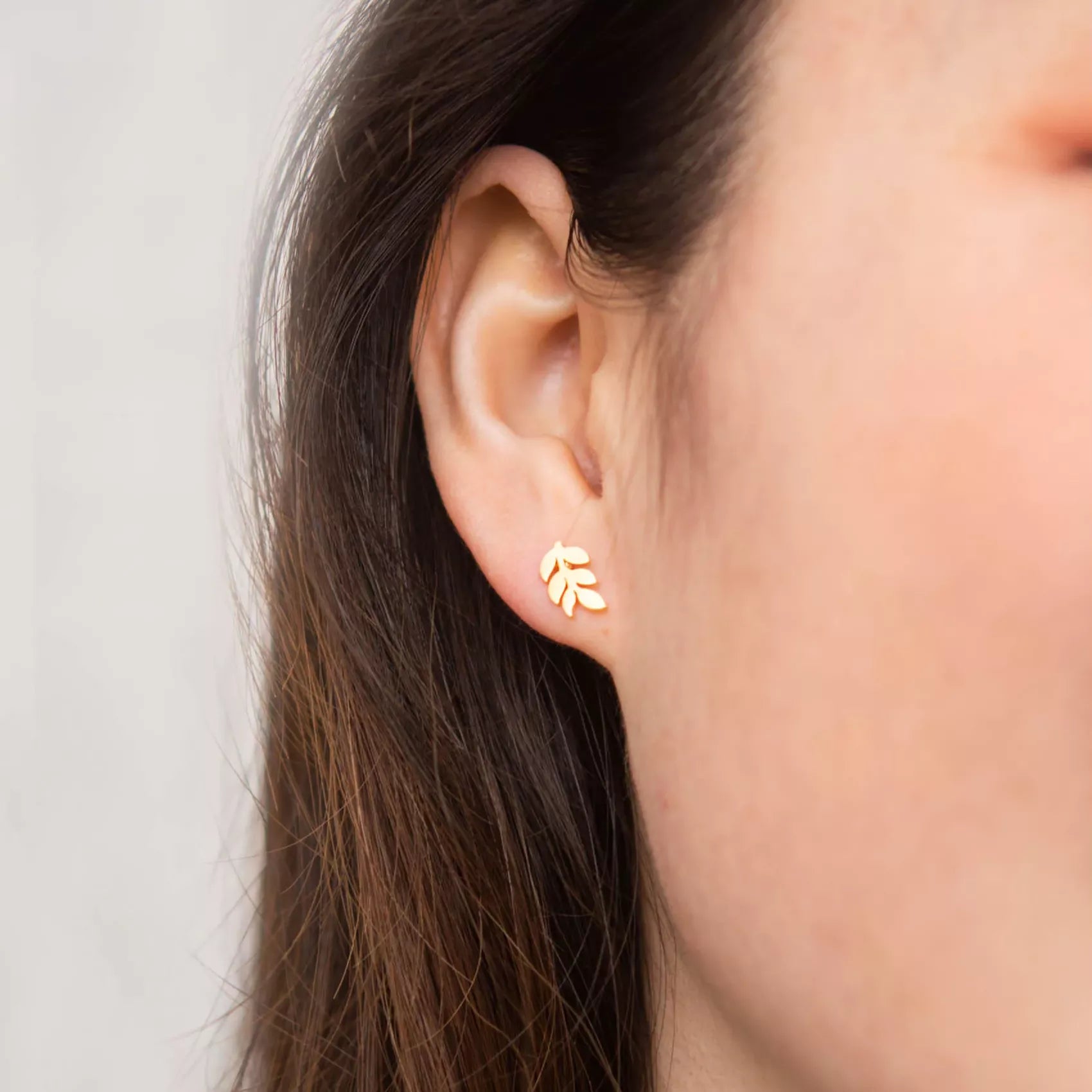 Rowen Leaf Stud Earrings in Gold Model Shot